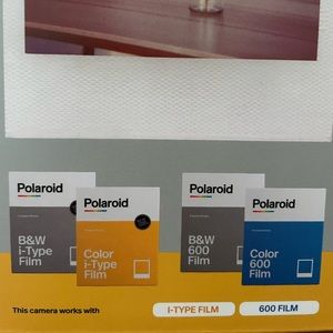 Polaroid Now bundle set with camera pouch. Brand new. Never opened.